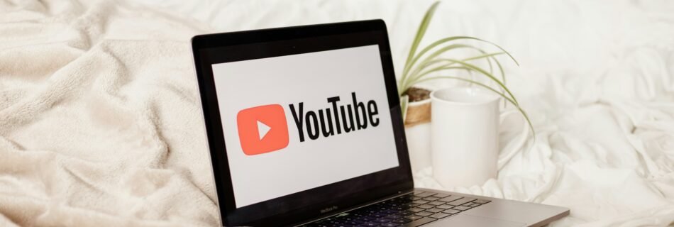 Influencer License in Dubai - Laptop with Youtube image on it.